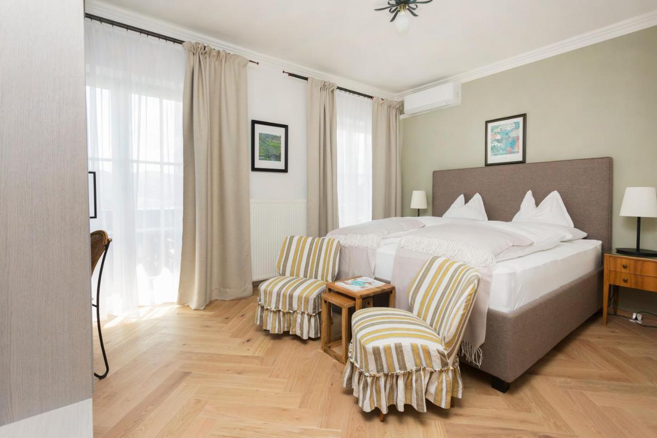 Boutique Hotel Aichinger ヌスドルフ・アム・アターゼー エクステリア 写真